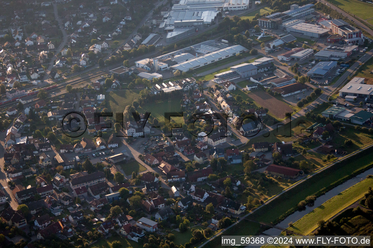 Aerial photograpy of Village on the banks of the area Kinzig - river course in Biberach in the state Baden-Wurttemberg