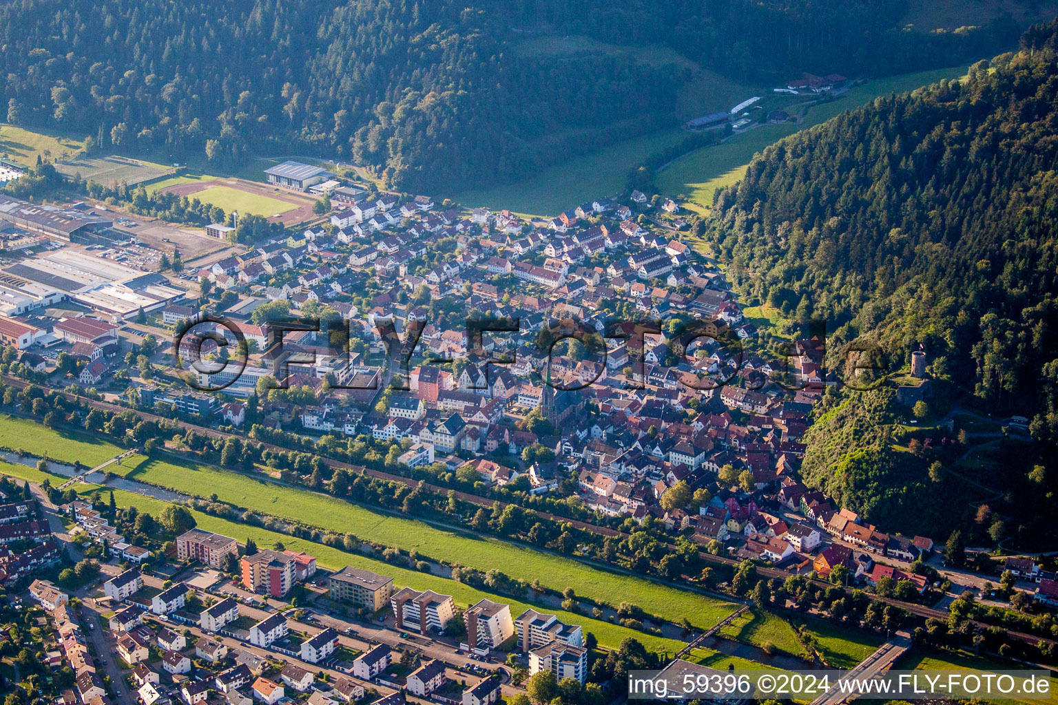 Aerial view of Village on the river bank areas of the Kinzig river in Hausach in the state Baden-Wurttemberg, Germany