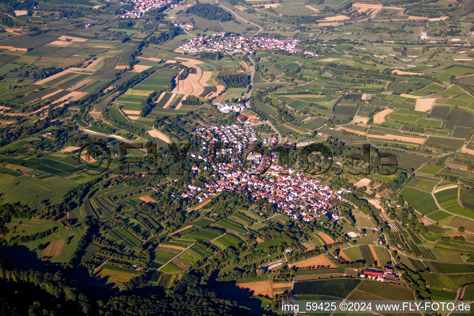 Village - view on the edge of agricultural fields and farmland in the district Broggingen in Herbolzheim in the state Baden-Wurttemberg, Germany