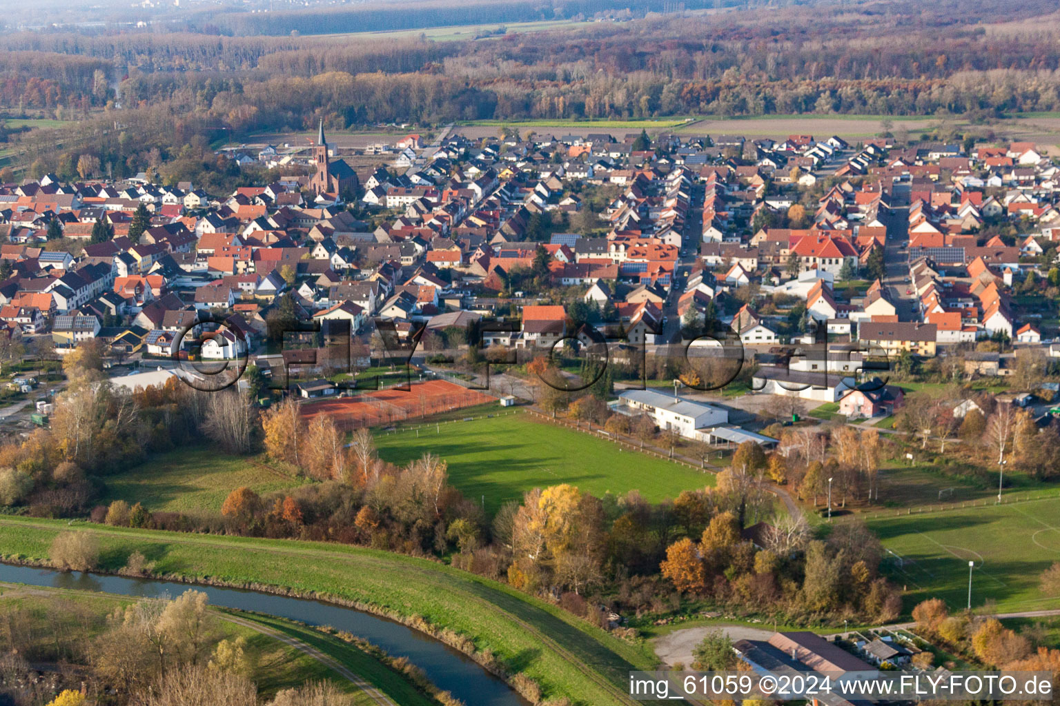 Village on the Saalbach Canal from the west in the district Rußheim in Dettenheim in the state Baden-Wuerttemberg, Germany