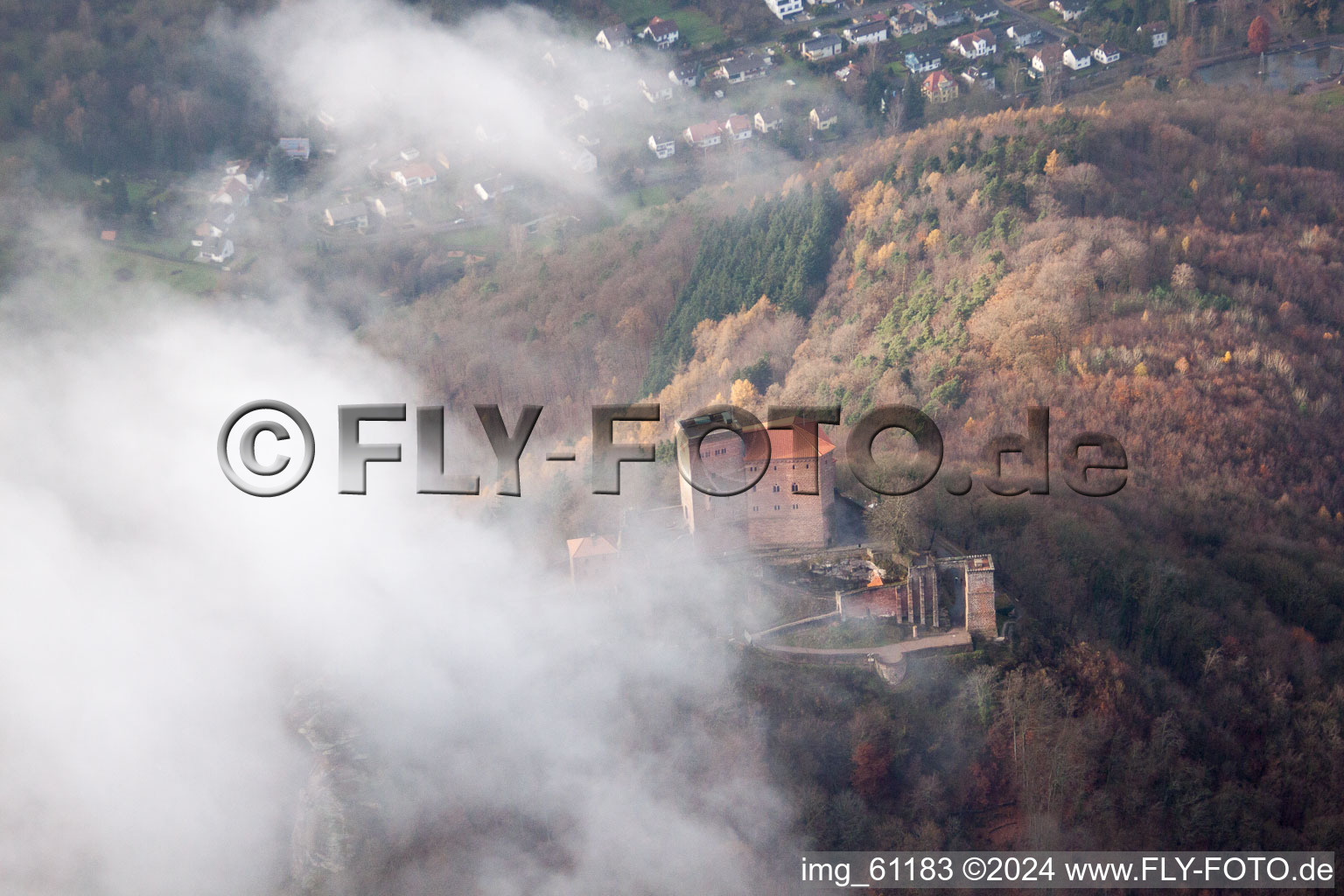 Trifels Castle in clouds in Leinsweiler in the state Rhineland-Palatinate, Germany