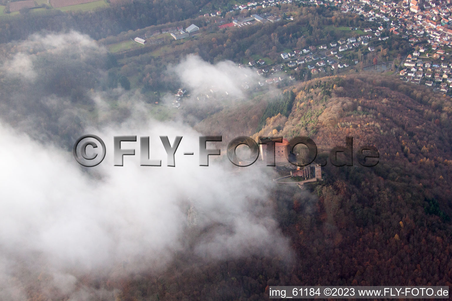 Aerial view of Trifels Castle in clouds in Annweiler am Trifels in the state Rhineland-Palatinate, Germany