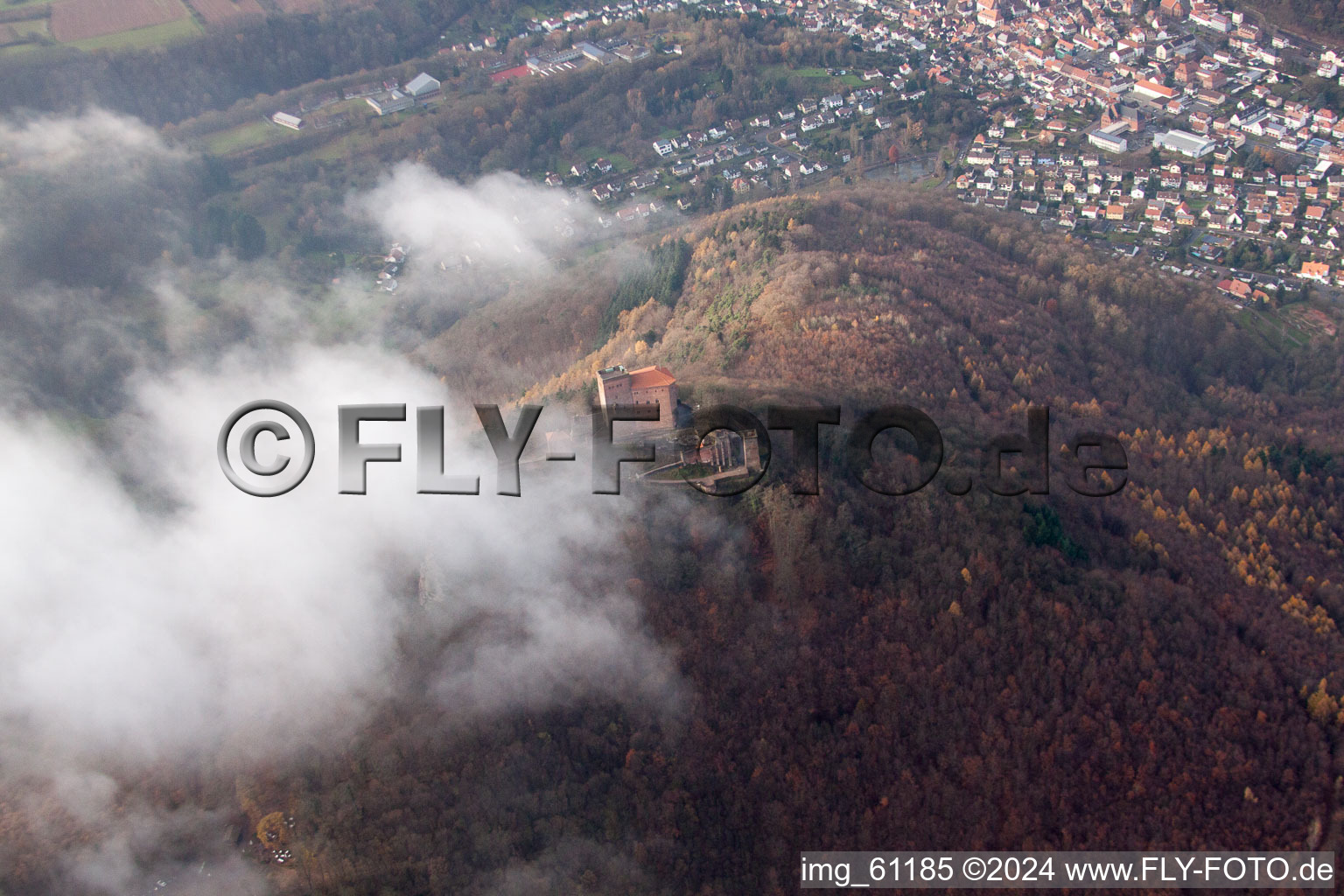 Aerial photograpy of Trifels Castle in clouds in Annweiler am Trifels in the state Rhineland-Palatinate, Germany