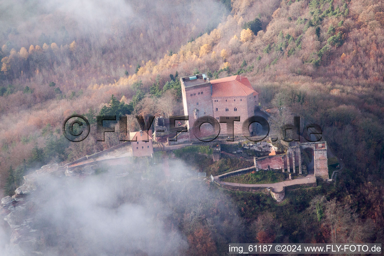 Oblique view of Trifels Castle in clouds in Annweiler am Trifels in the state Rhineland-Palatinate, Germany