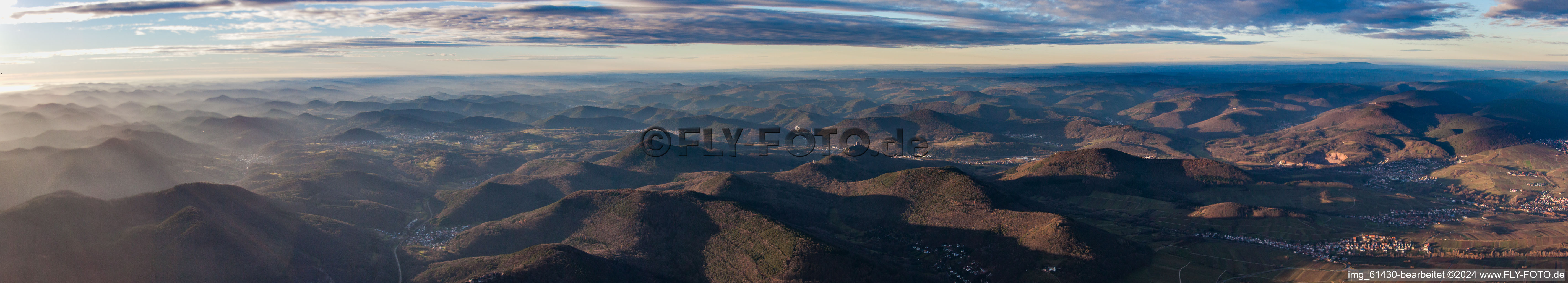 Panoramic perspective of Forest and mountain scenery in evening light of Haardtrand of Pfaelzerwalds in Leinsweiler in the state Rhineland-Palatinate, Germany