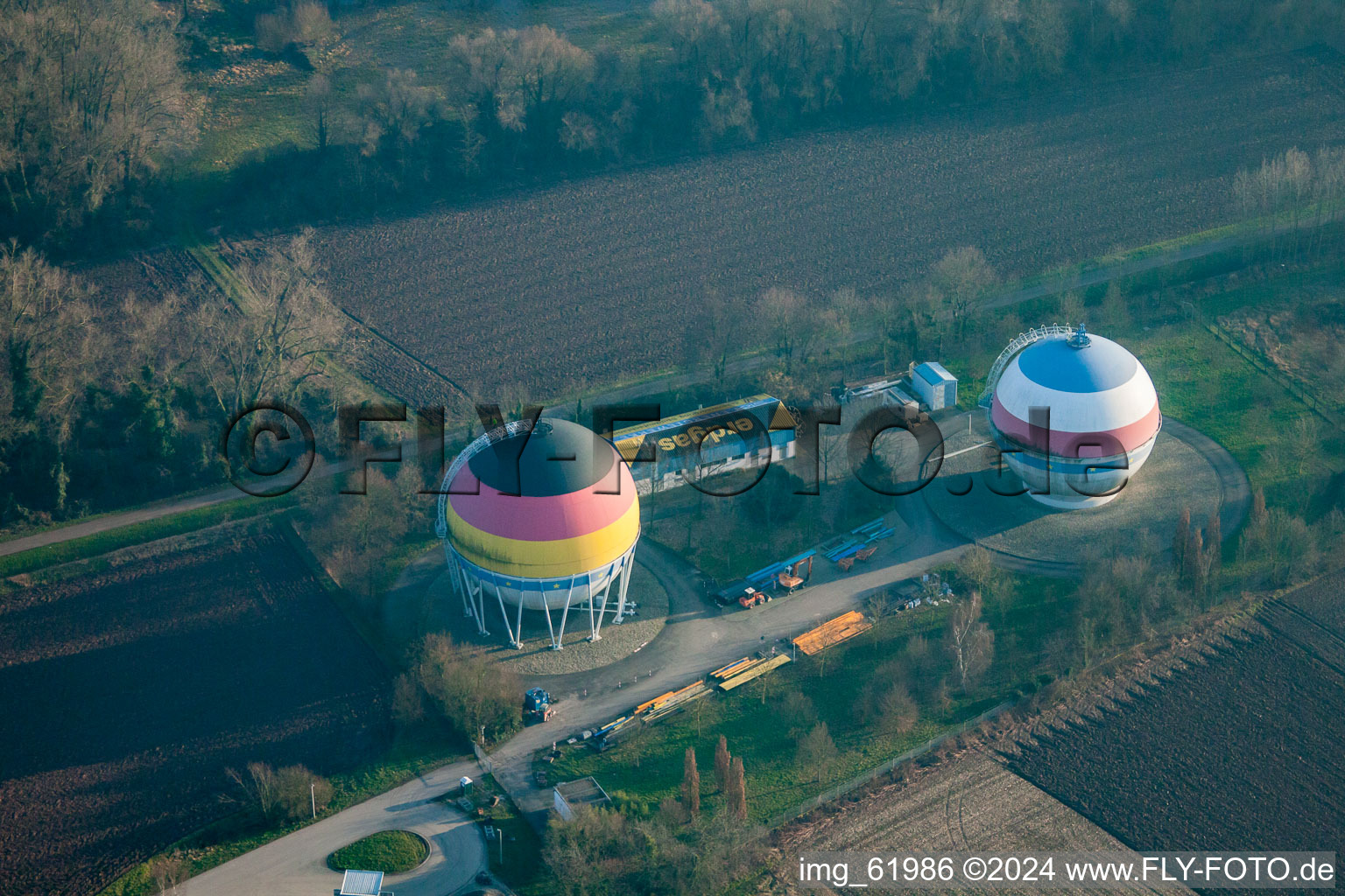 Aerial view of French German painted gas storage tanks in Rastatt in the state Baden-Wuerttemberg, Germany