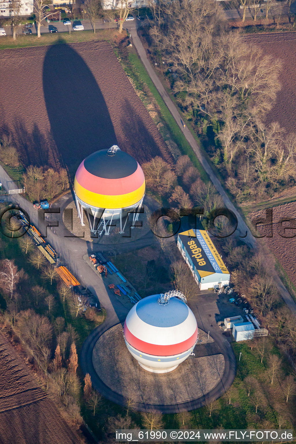 French German painted gas storage tanks in Rastatt in the state Baden-Wuerttemberg, Germany from above