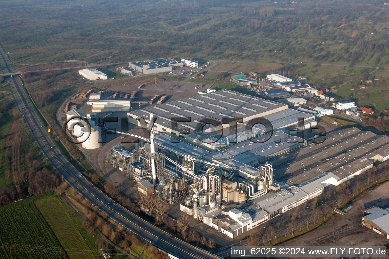 Aerial photograpy of Building and production halls on the premises of Spanplattenfabirk Kronospan GmbH in Bischweier in the state Baden-Wurttemberg, Germany