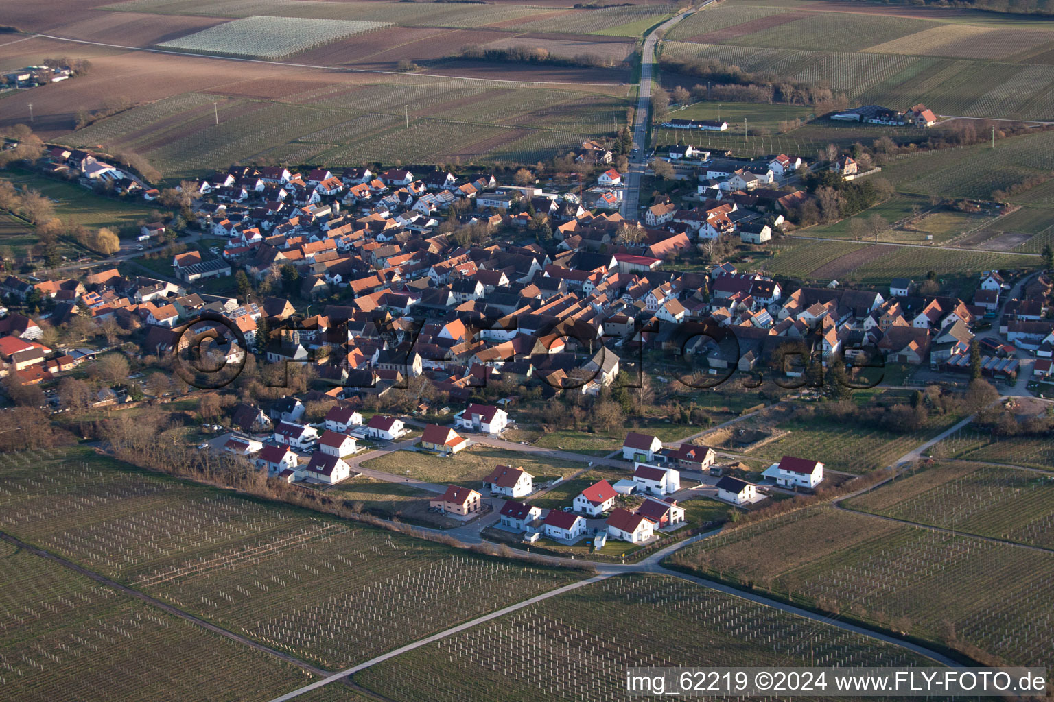 Village - view on the edge of agricultural fields and farmland in Impflingen in the state Rhineland-Palatinate, Germany out of the air