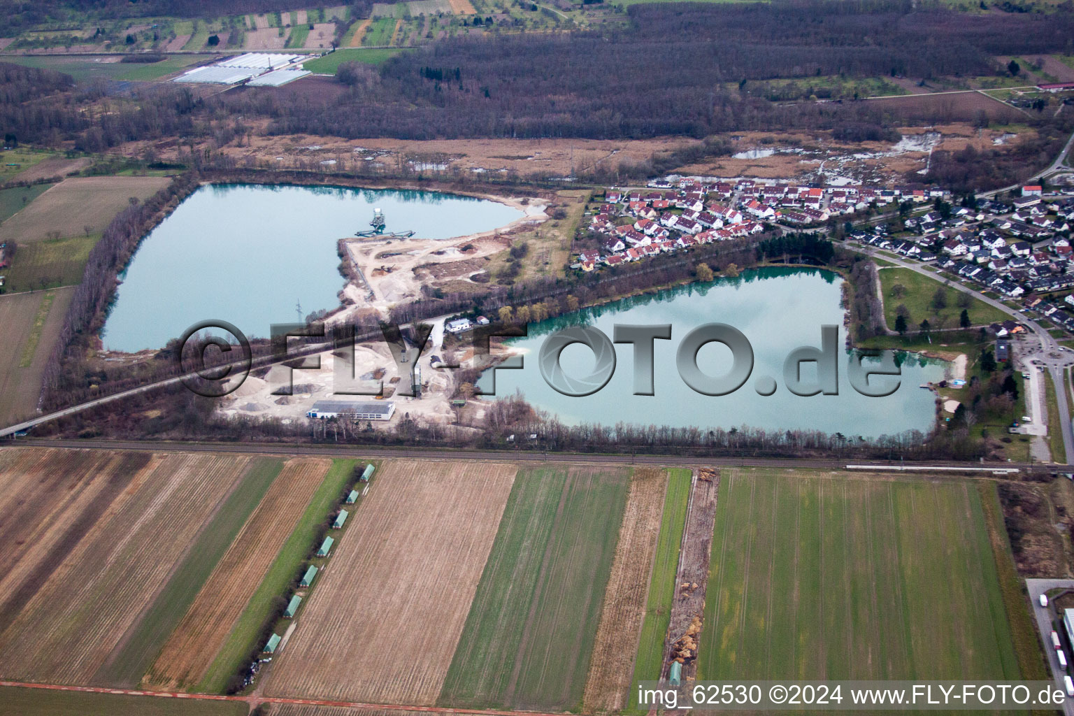 Aerial view of Gebr. Klatenbach gravel works in Muggensturm in the state Baden-Wuerttemberg, Germany