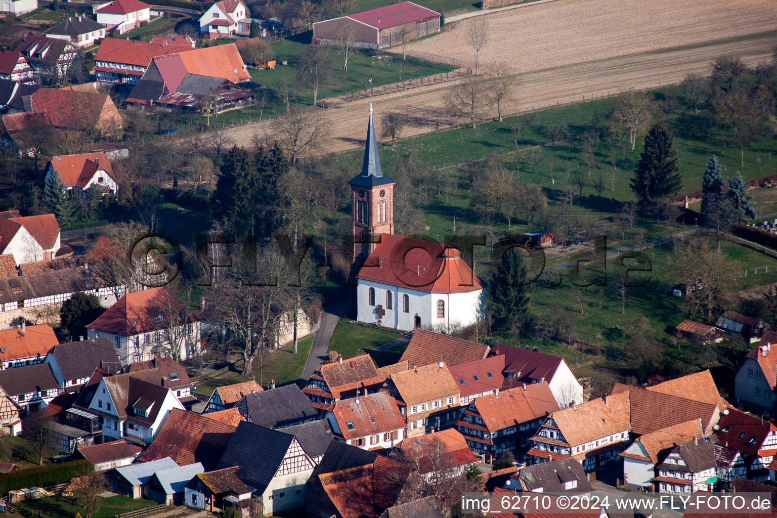 Aerial view of Protestant Church building in the village of in Hunspach in Grand Est, France