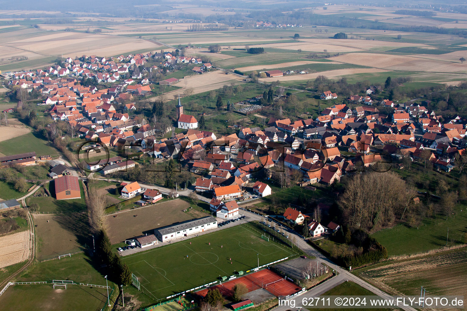 Sports grounds and football pitch at the edge of Hunspach in Grand Est, France