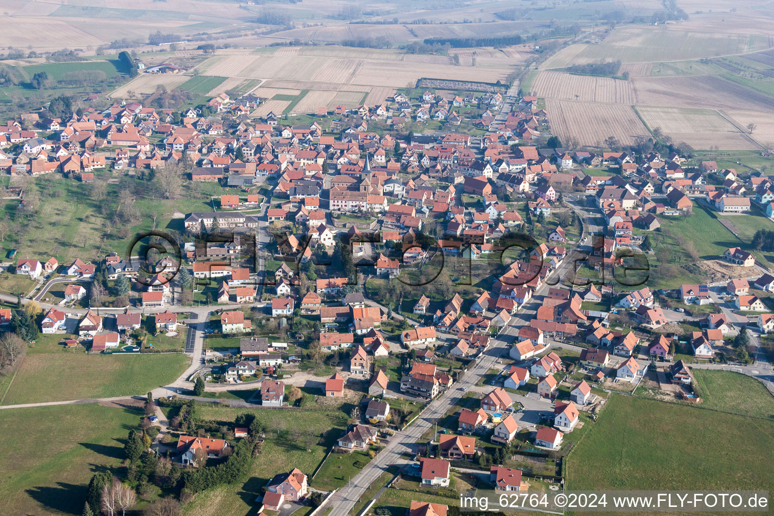 Oblique view of Village - view on the edge of agricultural fields and farmland in Surbourg in Grand Est, France