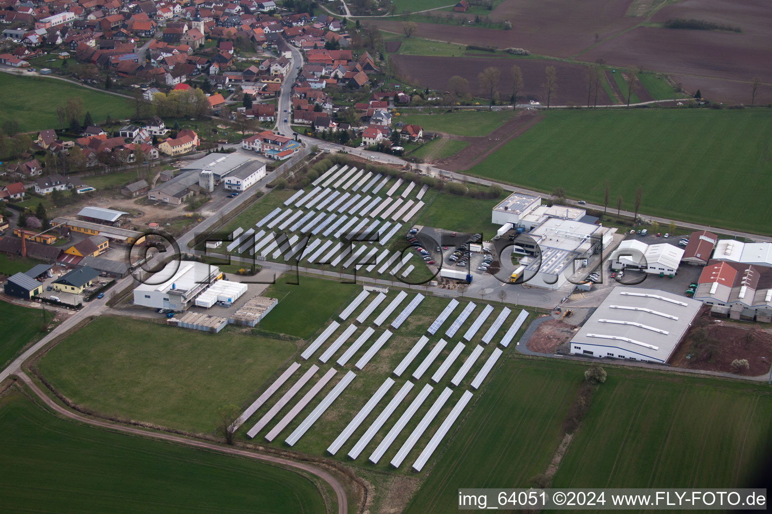 Aerial photograpy of Village - view on the edge of agricultural fields and farmland in Straufhain in the state Thuringia, Germany