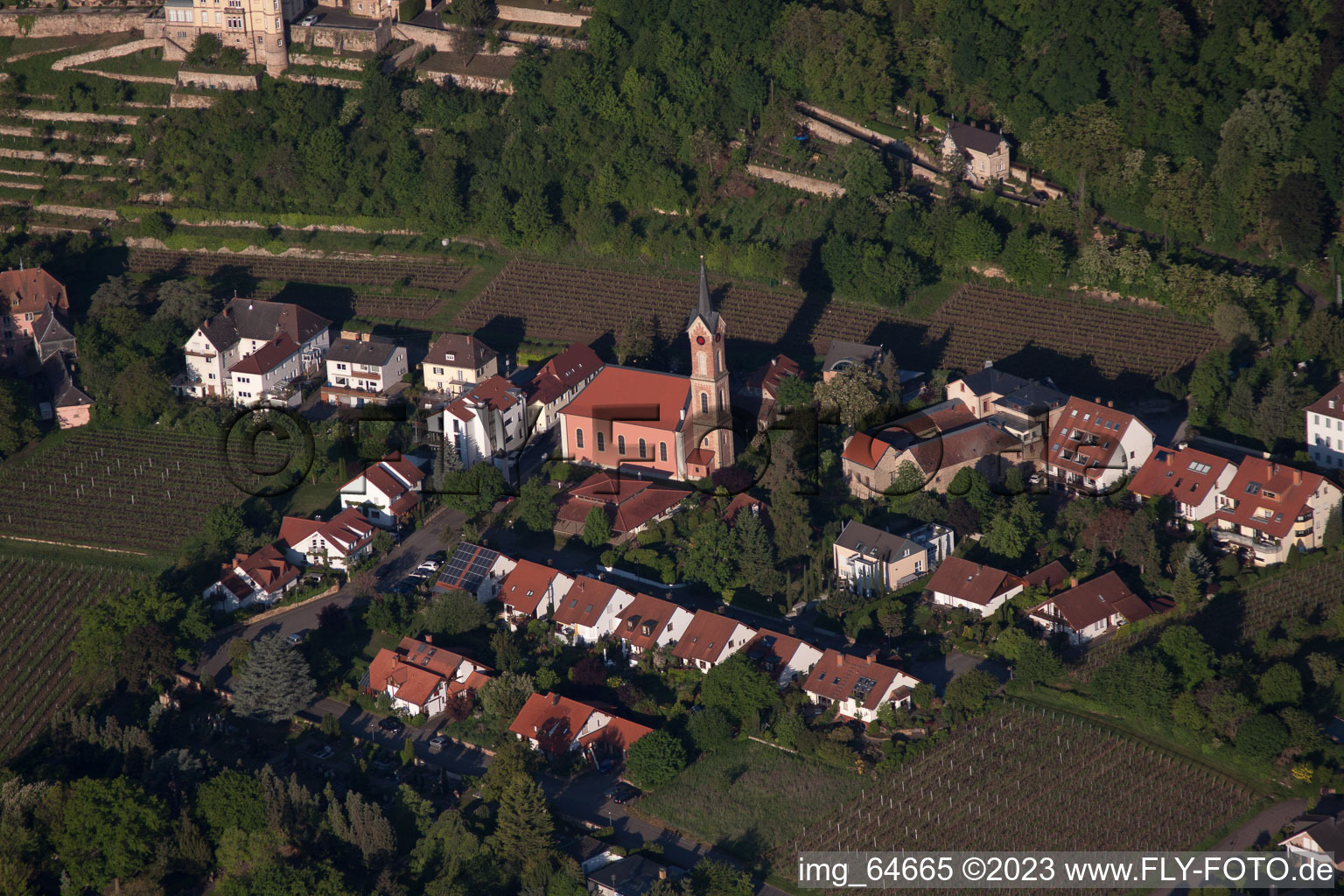 Village - view on the edge of agricultural fields and farmland in Haardt an der Weinstraße in the state Rhineland-Palatinate, Germany