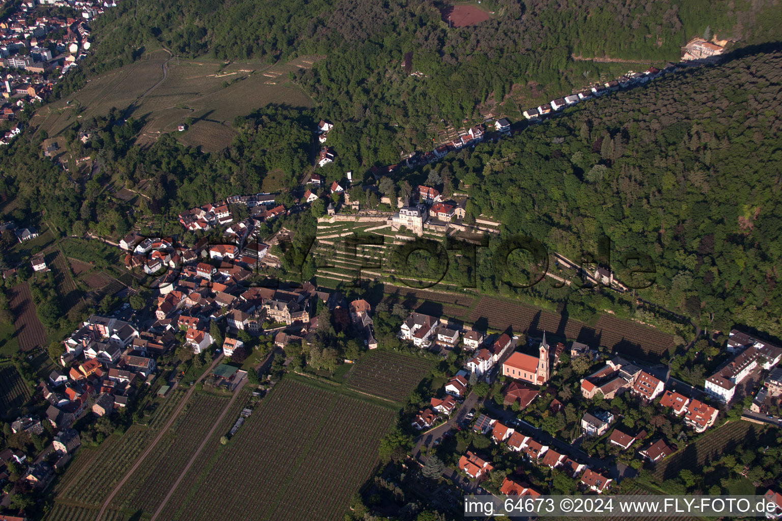 Aerial view of Village - view on the edge of agricultural fields and farmland in Haardt an der Weinstraße in the state Rhineland-Palatinate, Germany