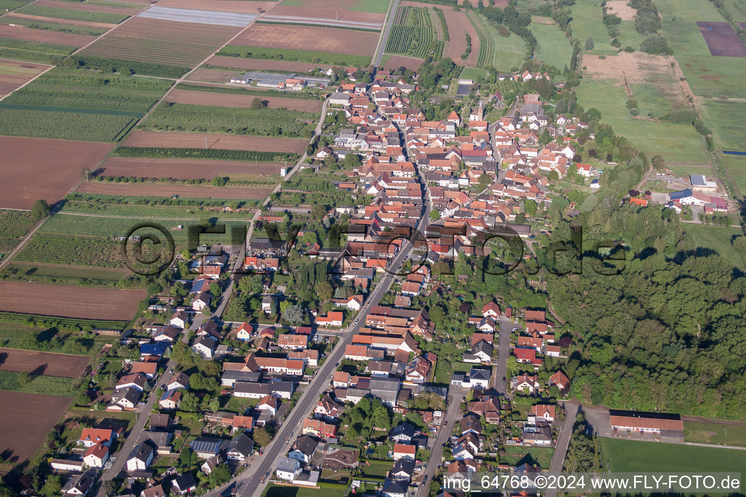 Village - view on the edge of agricultural fields and farmland in Winden in the state Rhineland-Palatinate, Germany from above
