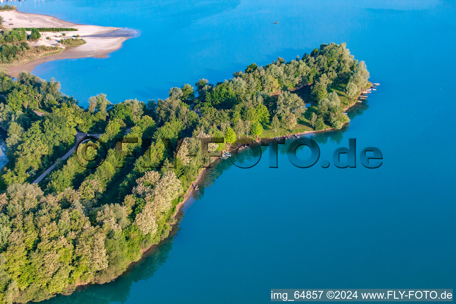 Fishing boats and beach at the bathing lake Giessen in the district Liedolsheim in Dettenheim in the state Baden-Wuerttemberg, Germany