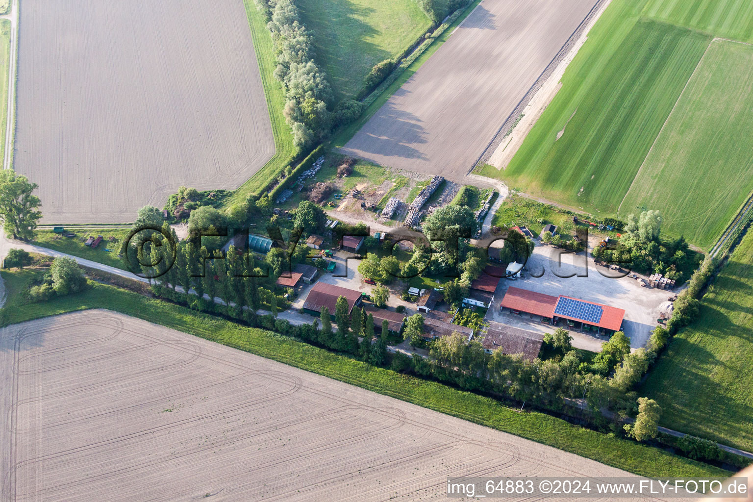 Barn building on the edge of agricultural fields and farmland Semler Rollrasen in Philippsburg in the state Baden-Wurttemberg, Germany