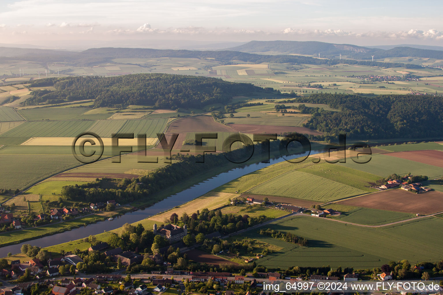 Aerial view of Village on the river bank areas of the Weser river in the district Daspe in Hehlen in the state Lower Saxony, Germany