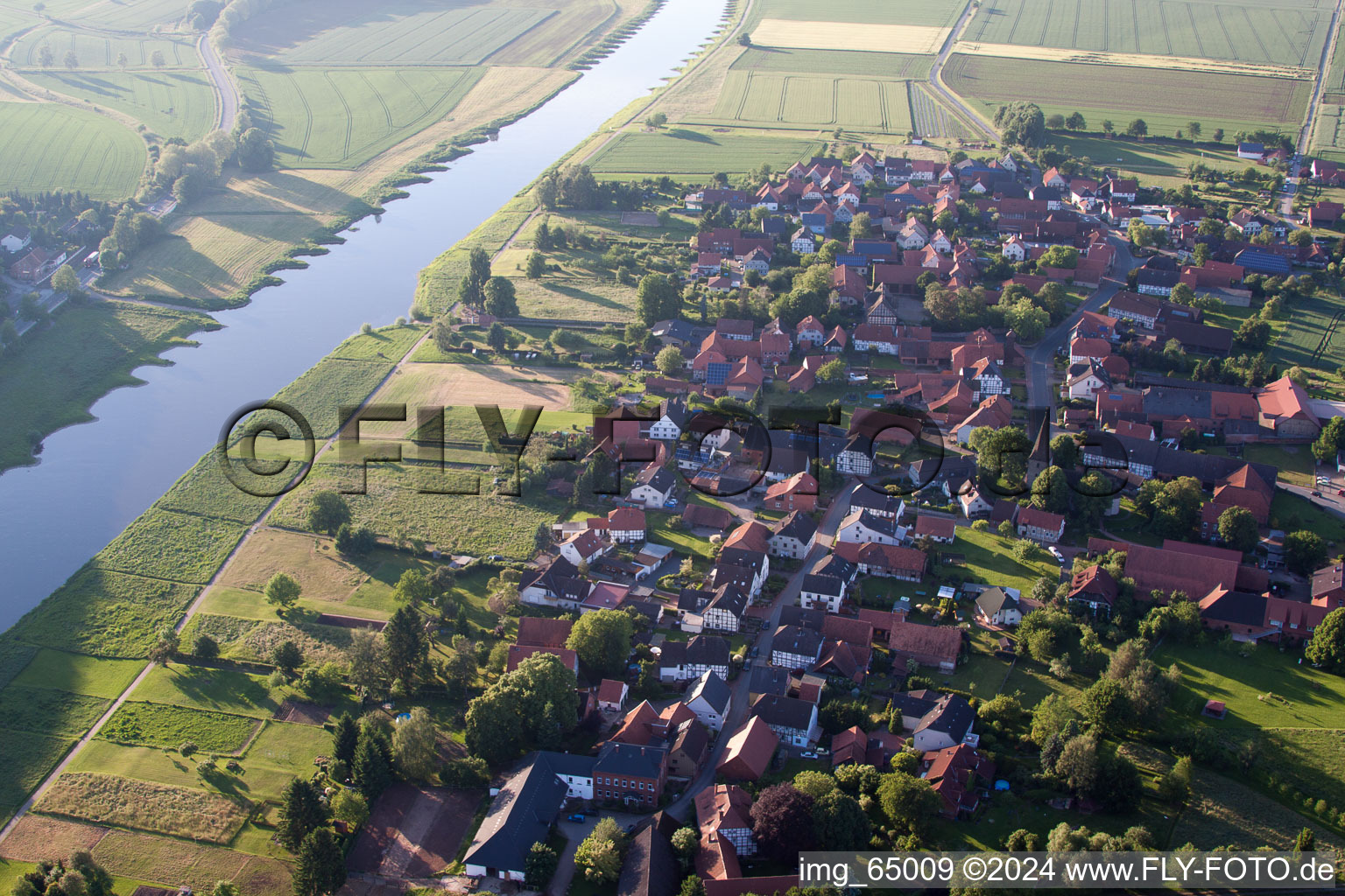 Village on the river bank areas of the Weser river in the district Hajen in Emmerthal in the state Lower Saxony, Germany