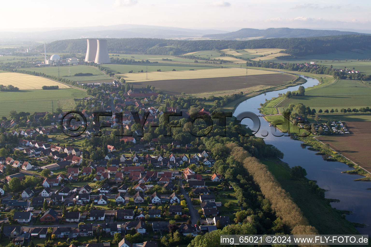 Aerial photograpy of Building remains of the reactor units and facilities of the NPP nuclear power plant Kernkraftwerk Grohnde on Weser in Emmerthal in the state Lower Saxony, Germany