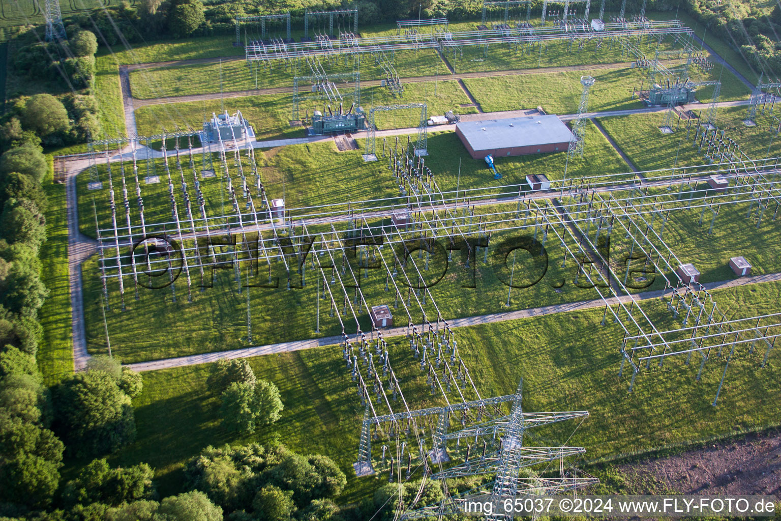 Aerial view of Site of the substation for voltage conversion and electrical power supply of Kernkraftwerk Grohnde in Emmerthal in the state Lower Saxony, Germany