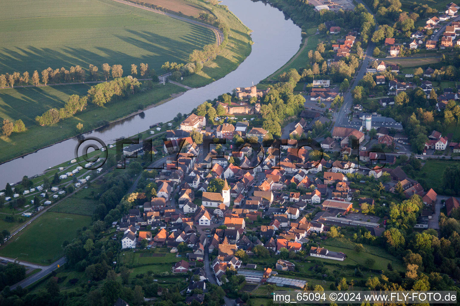 Village on the banks of the area Weser - river course in Polle in the state Lower Saxony, Germany