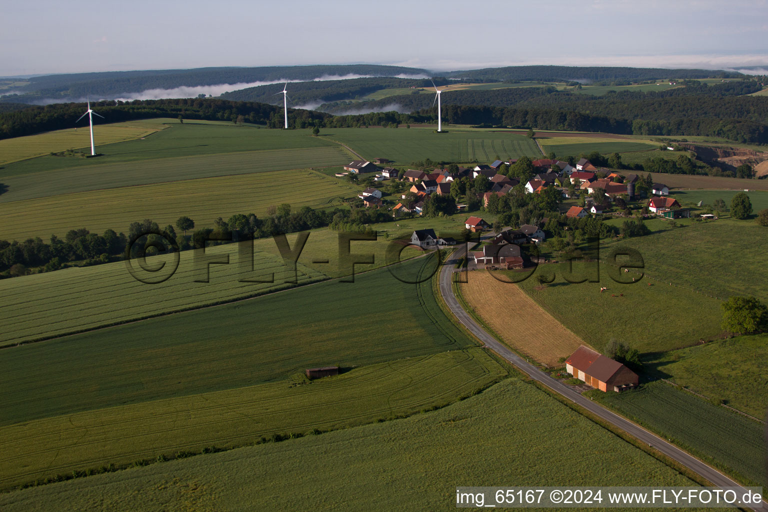 Wind turbine windmills on a field in the district Bremerberg in Marienmuenster in the state North Rhine-Westphalia