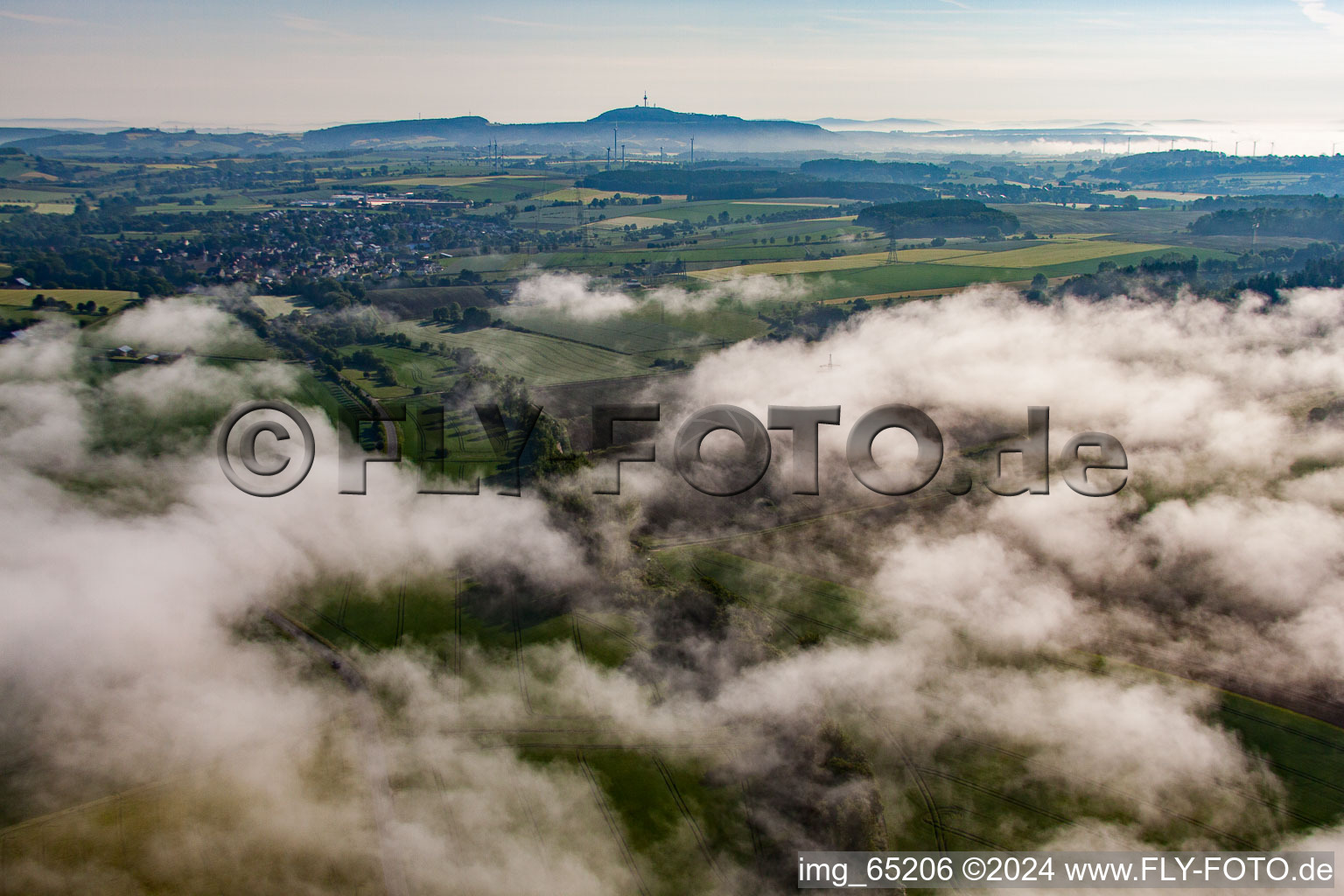 Place behind clouds in the district Bellersen in Brakel in the state North Rhine-Westphalia, Germany