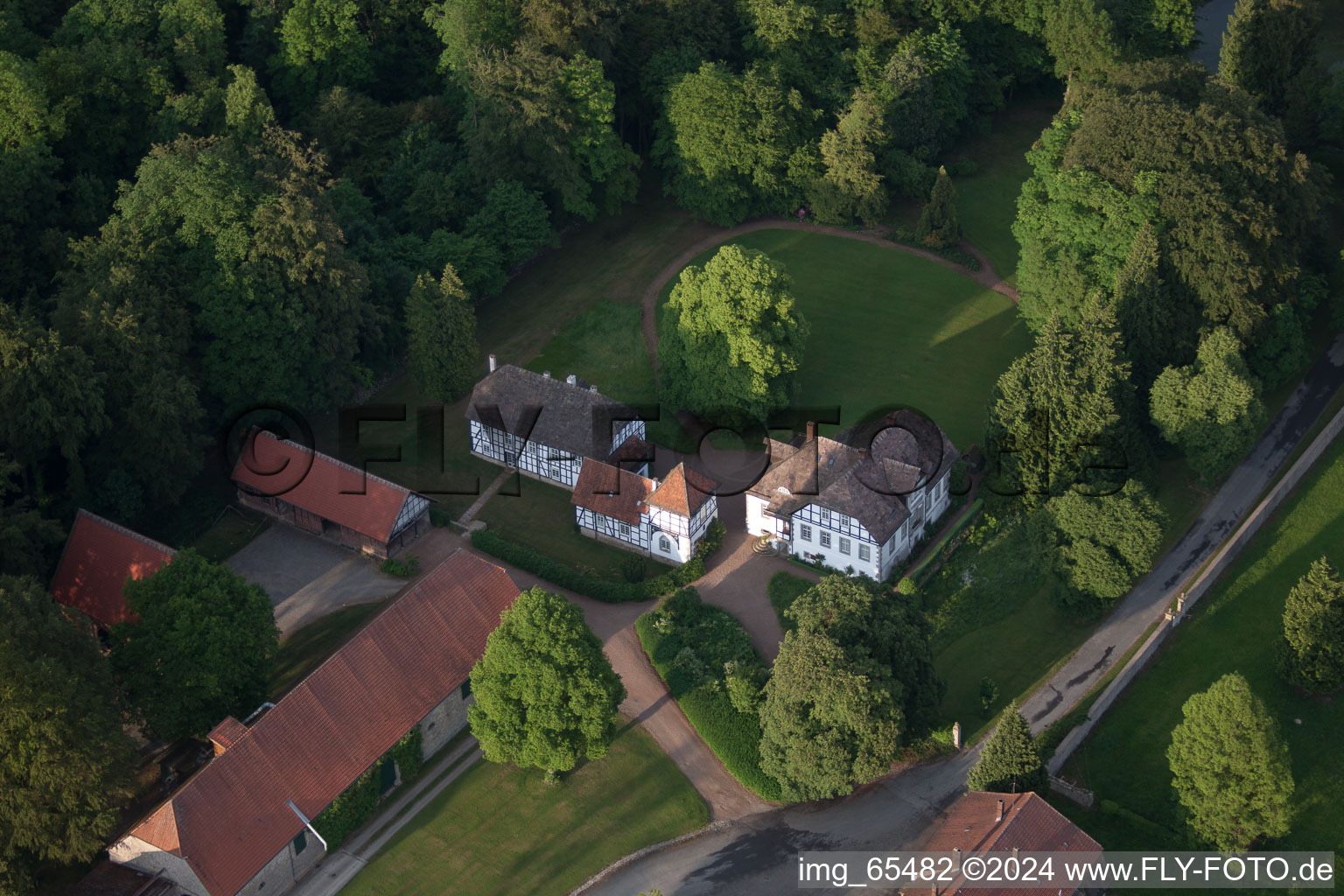 Aerial photograpy of Farm on the edge of cultivated fields in the district Abbenburg in Brakel in the state North Rhine-Westphalia