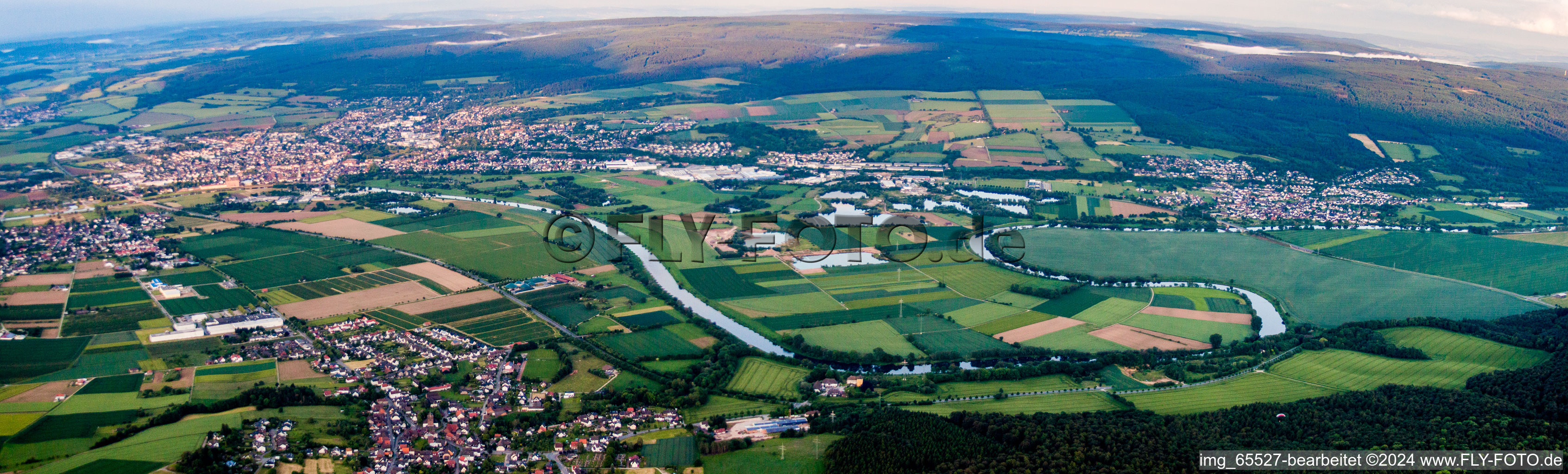 Panoramic perspective City view on the river bank of the Weser river in Holzminden in the state Lower Saxony, Germany