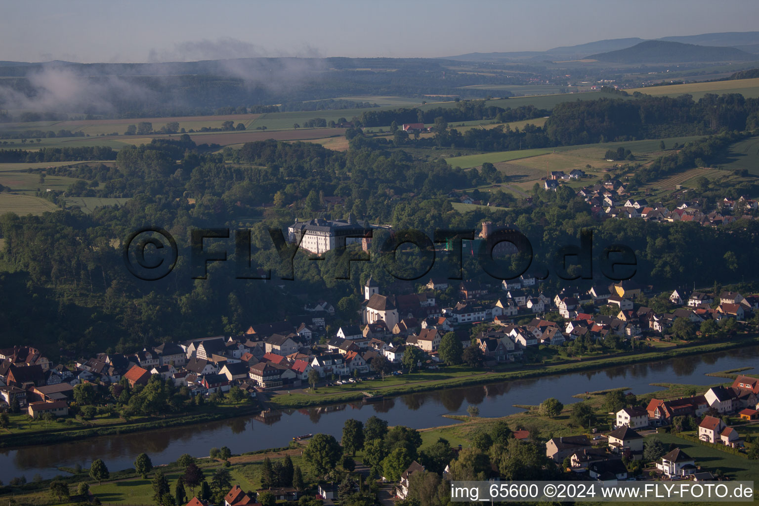 Village on the river bank areas of the Weser river in the district Herstelle in Beverungen in the state North Rhine-Westphalia, Germany