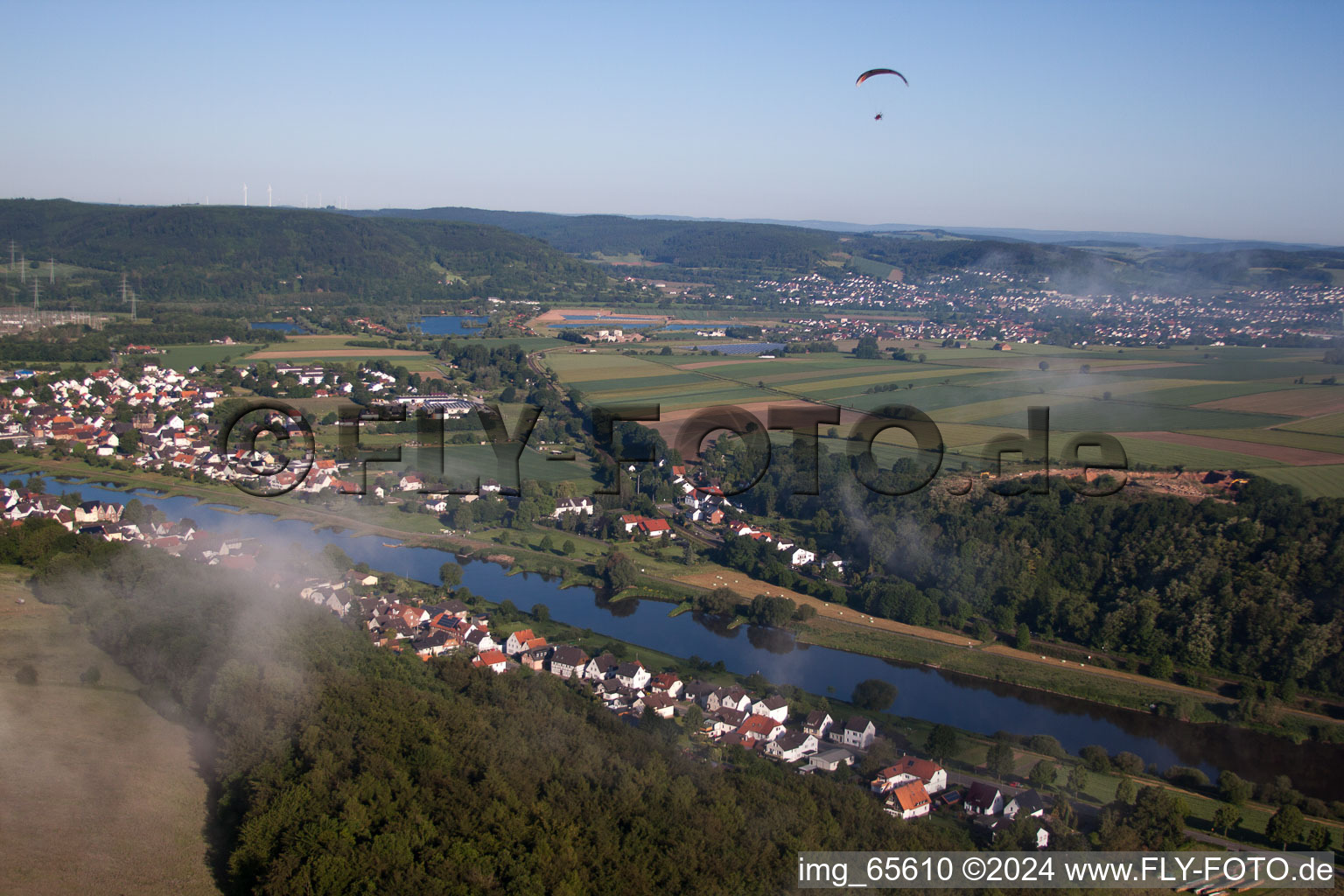 Village on the river bank areas of the Weser river between the district Herstelle and Wuergassen in Beverungen in the state North Rhine-Westphalia, Germany