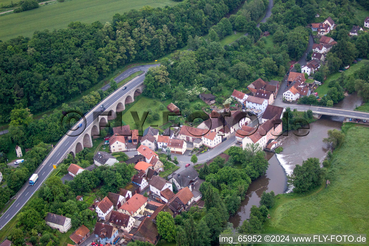 River - bridge construction crossing the Saale of Franken in Trimberg in the state Bavaria, Germany