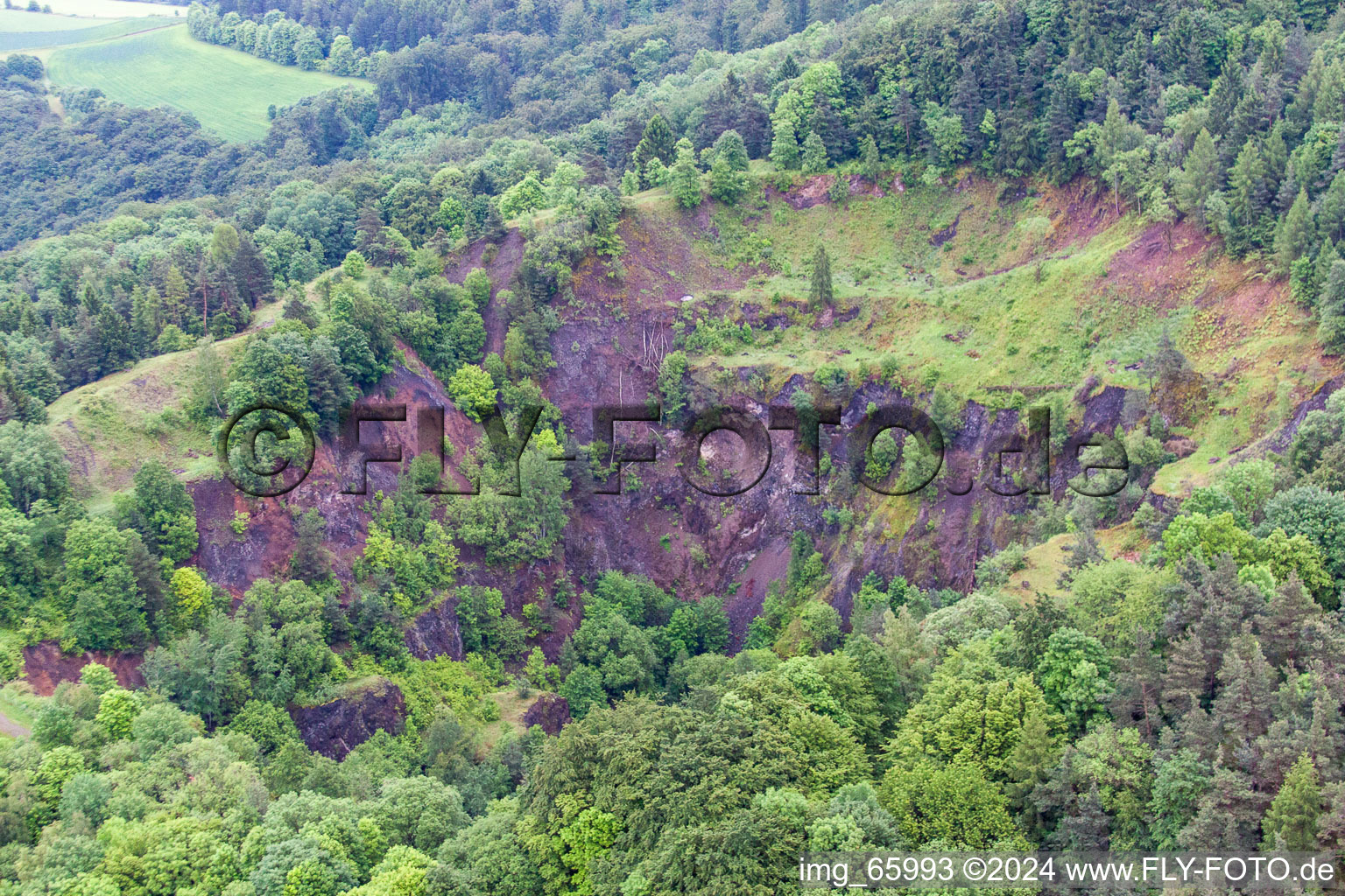 Oblique view of Old Basalt Quarry Sodenberg in the district Morlesau in Hammelburg in the state Bavaria, Germany