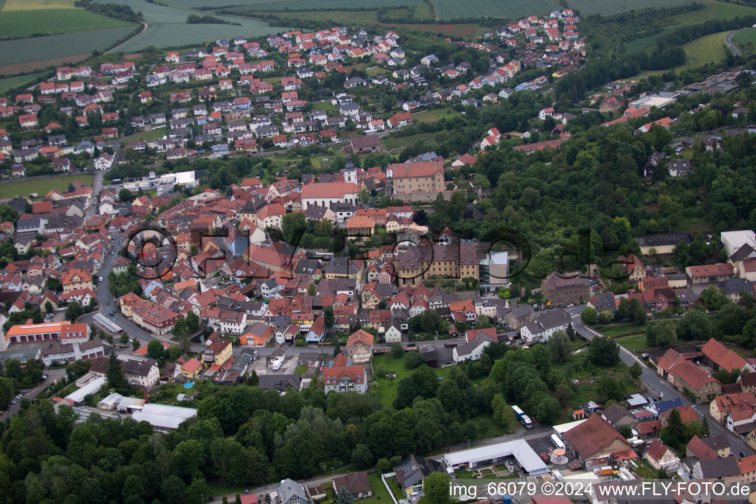 Town View of the streets and houses of the residential areas in Arnstein in the state Bavaria out of the air