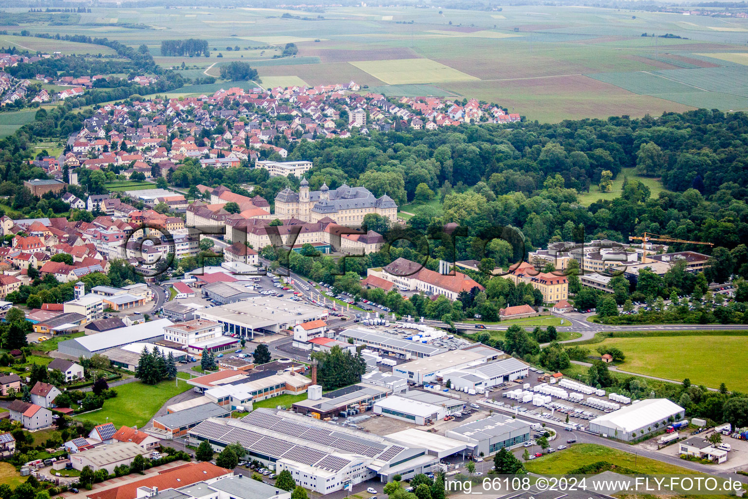 Industrial estate and company settlement in Werneck in the state Bavaria, Germany from above