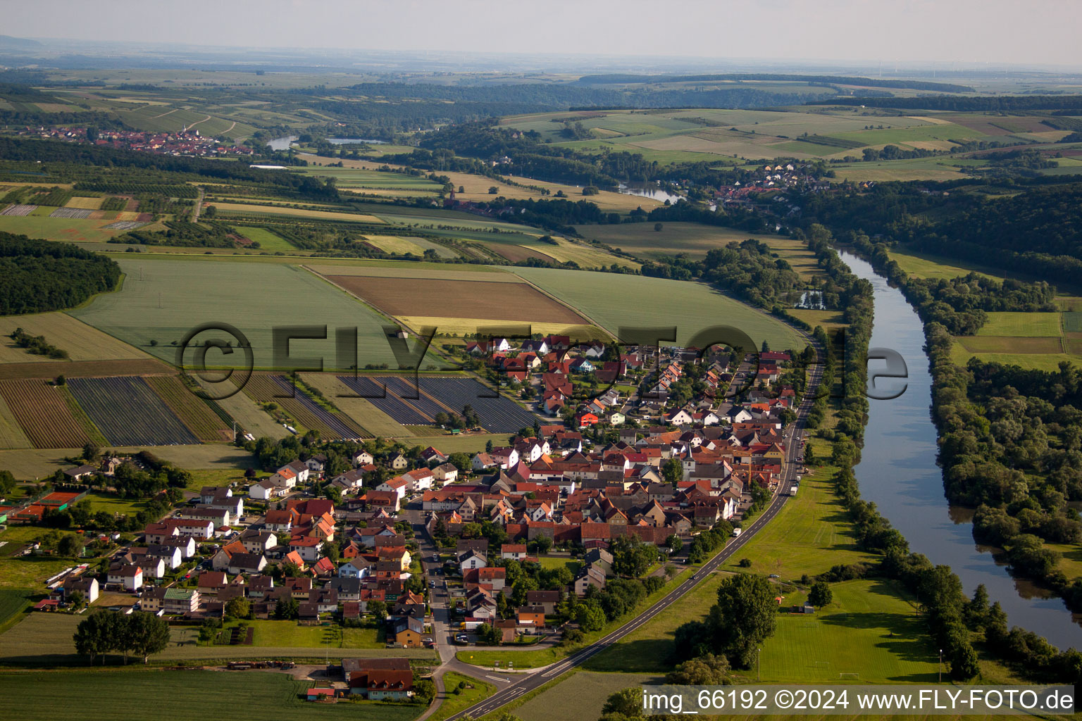 Aerial photograpy of Village on the river bank areas of the Main river in the district Hirschfeld in Roethlein in the state Bavaria, Germany