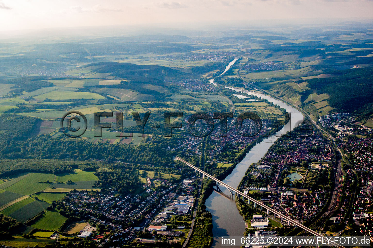 Railway River - bridge construction crossing the Main river in Veitshoechheim in the state Bavaria, Germany from above