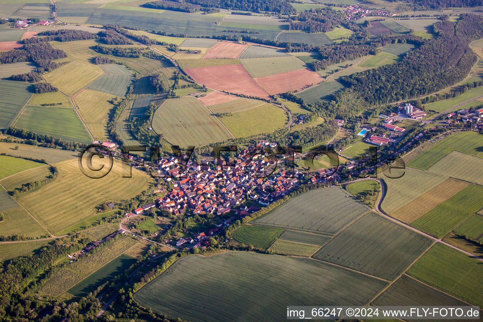 Village - view on the edge of agricultural fields and farmland in Wenkheim in the state Baden-Wurttemberg, Germany