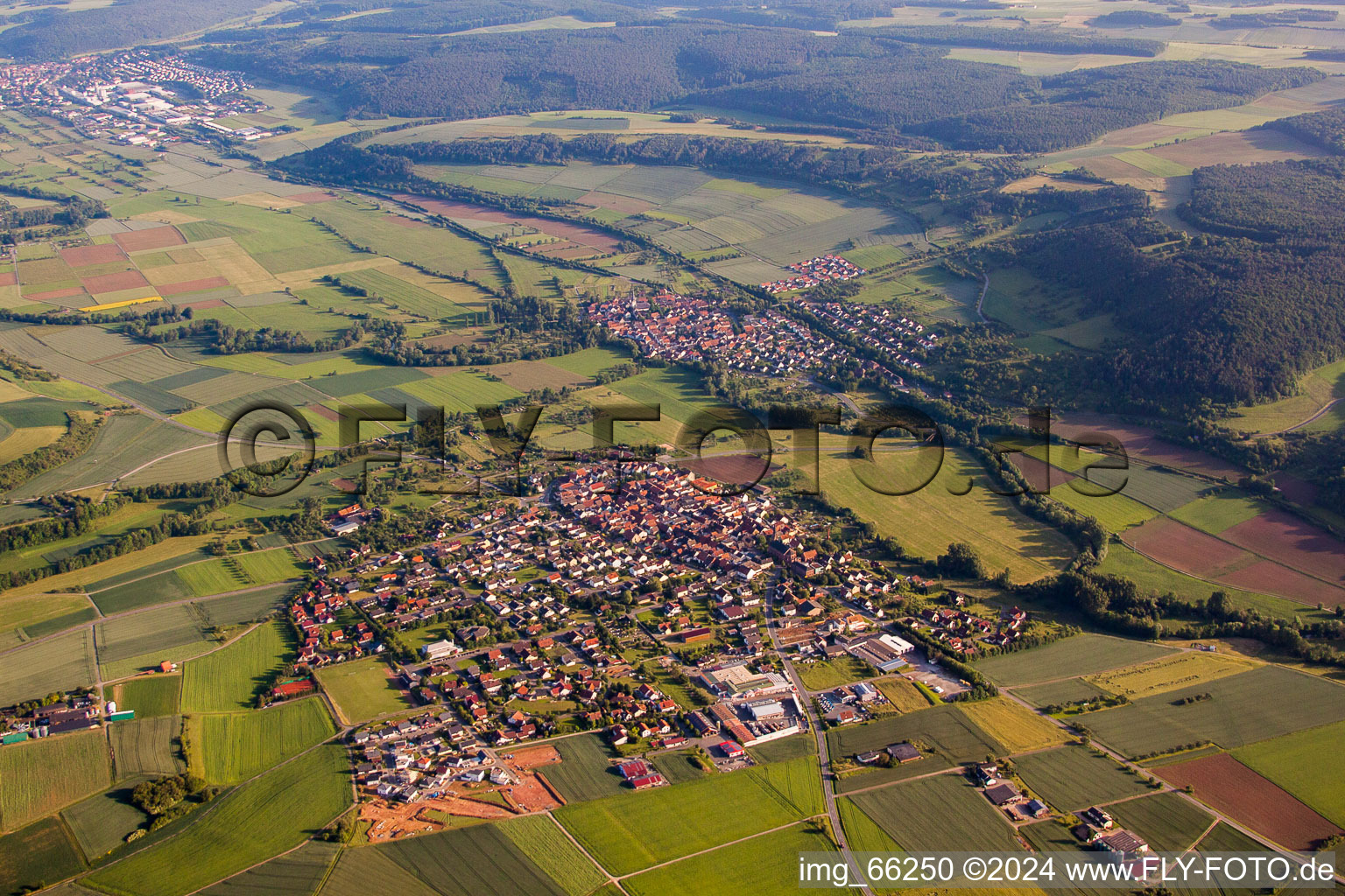 Village - view on the edge of agricultural fields and farmland in Werbach in the state Baden-Wurttemberg, Germany