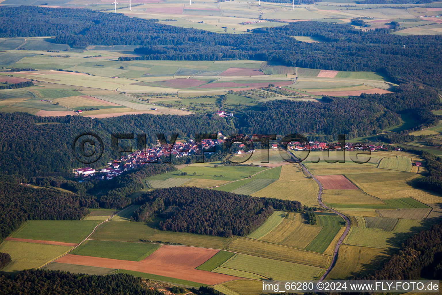 Aerial view of Village - view on the edge of agricultural fields and farmland in Waldstetten in the state Baden-Wurttemberg, Germany