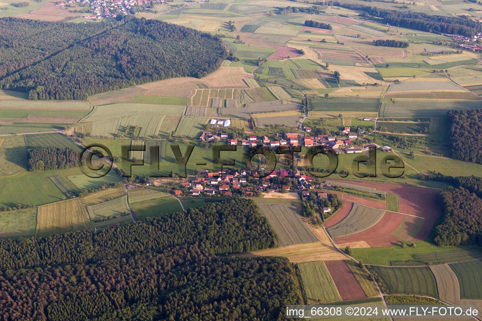 Village - view on the edge of agricultural fields and farmland in Einbach in the state Baden-Wurttemberg, Germany