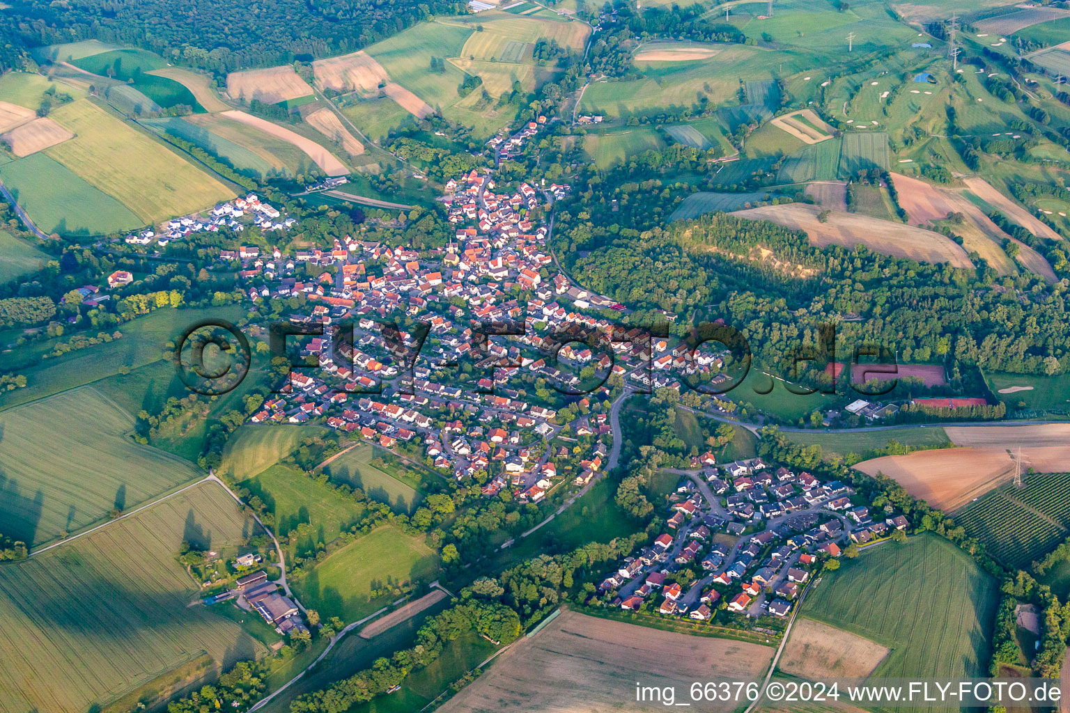 Village - view on the edge of agricultural fields and farmland in Schatthausen in the state Baden-Wurttemberg, Germany