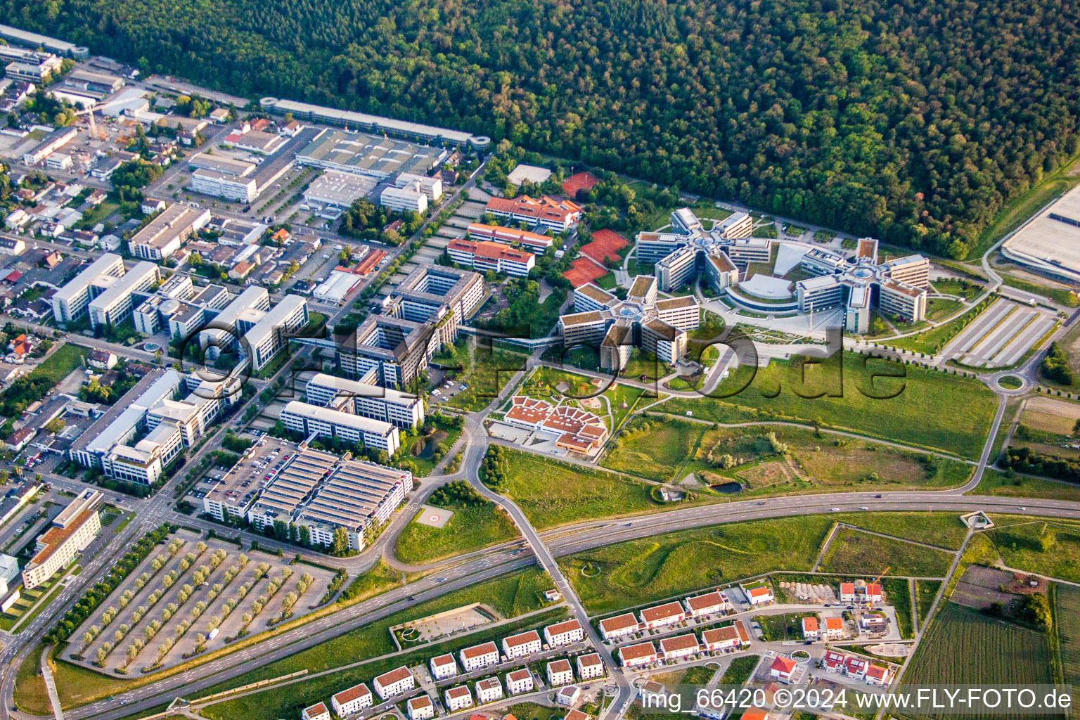 Aerial view of 3 star-shaped Corporate management high-rise buildings of SAP SE in Walldorf in the state Baden-Wurttemberg, Germany