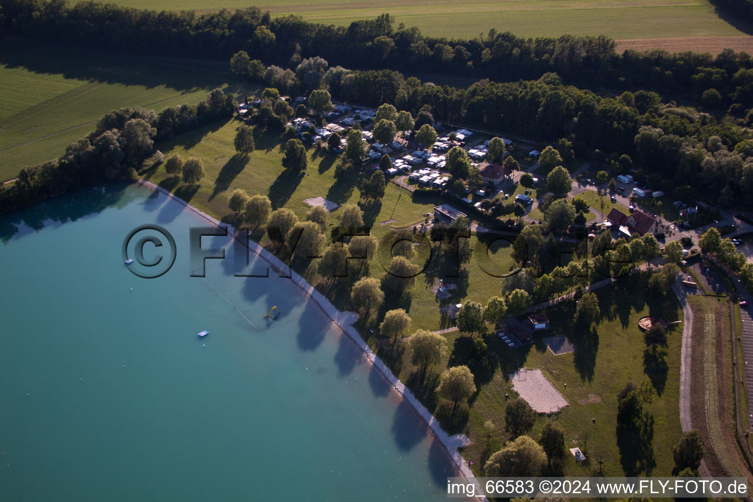 Quarry lake in Lauterbourg in the state Bas-Rhin, France from above