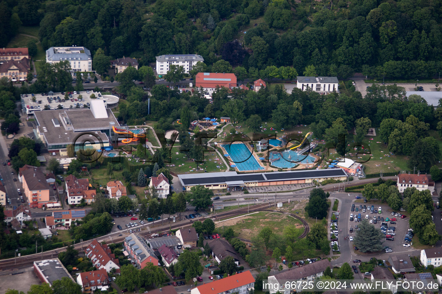 Aerial view of Bathers on the lawn by the pool of the swimming pool Albgau Freibad in Ettlingen in the state Baden-Wurttemberg