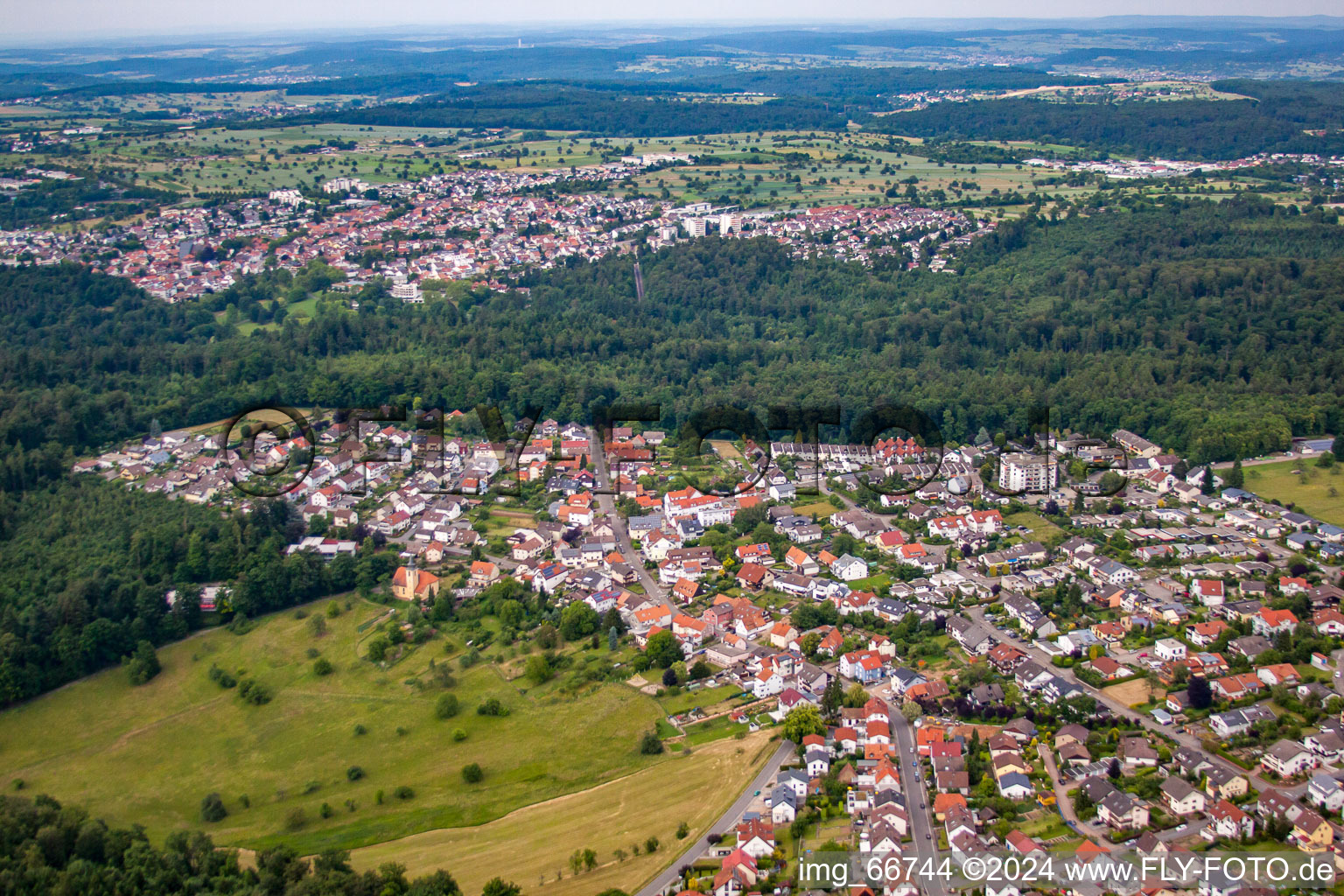 Village - view on the edge of agricultural fields and farmland in Etzenrot in the state Baden-Wurttemberg, Germany