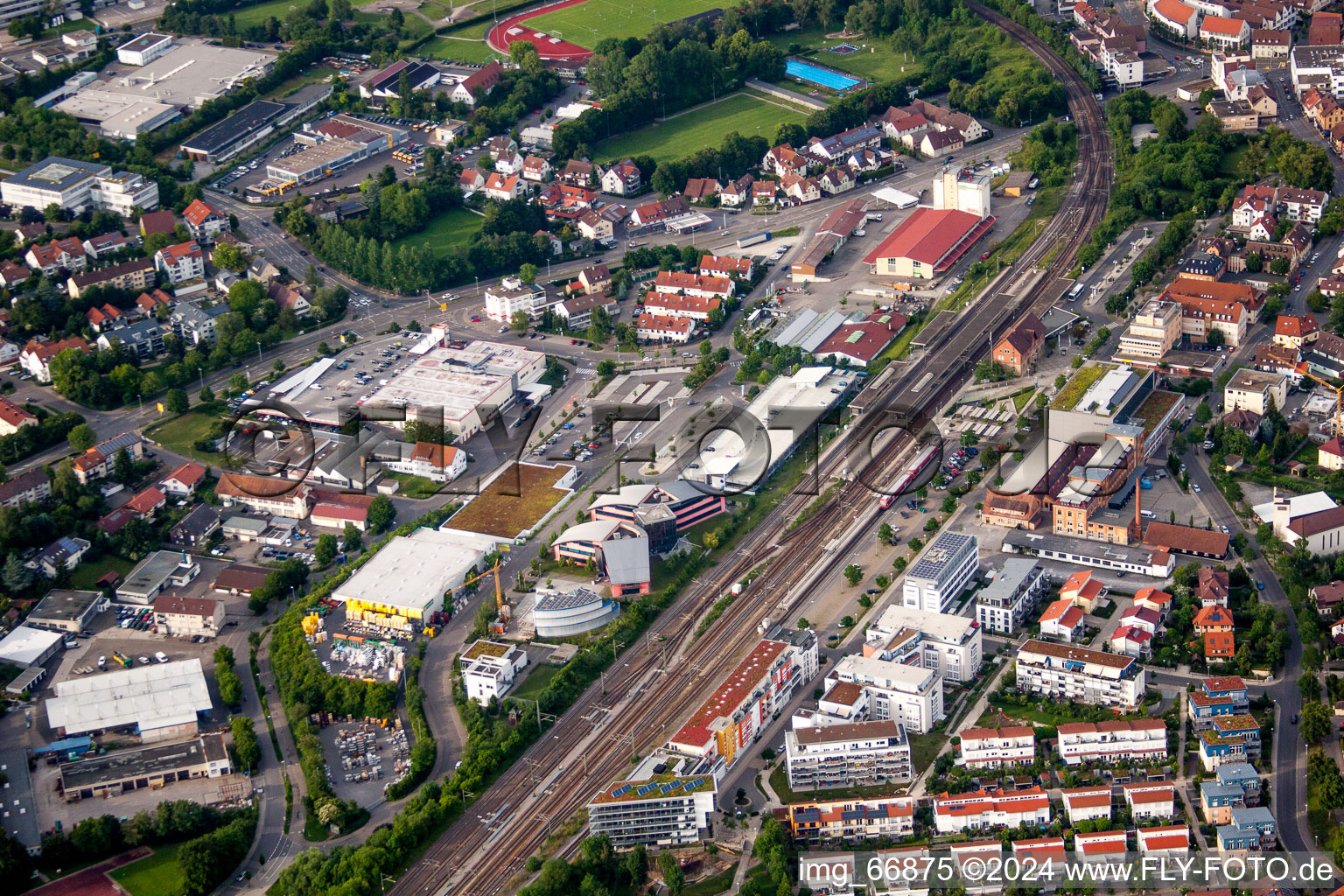 Aerial view of Station building and track systems of the S-Bahn station Herrenberg with UDG Herrenberg GmbH in Herrenberg in the state Baden-Wurttemberg, Germany